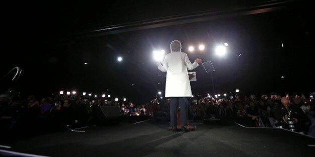 Democratic presidential candidate Hillary Clinton addresses supporters at her Super Tuesday election night rally in Miami, Tuesday, March 1, 2016. (AP Photo/Gerald Herbert)