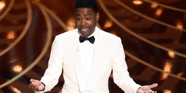 Host Chris Rock speaks at the Oscars on Sunday, Feb. 28, 2016, at the Dolby Theatre in Los Angeles. (Photo by Chris Pizzello/Invision/AP)