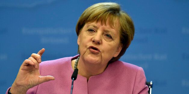German Chancellor Angela Merkel gestures while speaking during a final press conference after an EU summit in Brussels on Friday, Feb. 19, 2016. British Prime Minister David Cameron pushed a summit into overtime Friday after a second day of tense talks with weary European Union leaders unwilling to fully meet his demands for a less intrusive EU. (AP Photo/Martin Meissner)