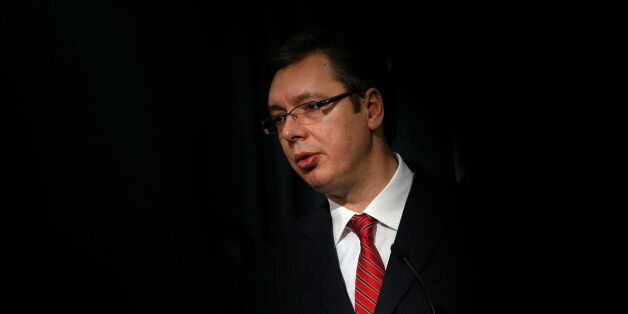 Serbian Prime Minister Aleksandar Vucic speaks during a news conference in Belgrade, Serbia, Saturday, Feb. 20, 2016. Two Serbian embassy staffers held hostage since November died in Friday's U.S. airstrikes on an Islamic State camp in western Libya that killed dozens, Serbian officials said Saturday. Prime Minister Aleksandar Vucic said there was no doubt that Sladjana Stankovic, a communications officer, and Jovica Stepic, a driver, were killed in the American bombing. They were snatched in November after their diplomatic convoy, including the ambassador, came under fire near the coastal Libyan city of Sabratha. (AP Photo/Darko Vojinovic)