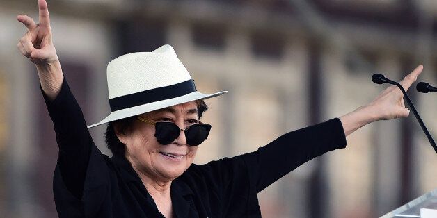 Japanese musician and artist Yoko Ono, widow of John Lennon, waves before an event of the Secretary of Cultura at Zocalo Square in Mexico City, on February 2, 2016. Yoko Ono is in Mexico for diverse activities. AFP PHOTO/ALFREDO ESTRELLA / AFP / ALFREDO ESTRELLA (Photo credit should read ALFREDO ESTRELLA/AFP/Getty Images)