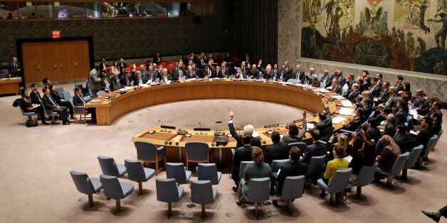The United Nations Security Council votes on a resolution during a meeting at U.N. headquarters, Wednesday, March 2, 2016. The U.N. Security Council voted Wednesday on a resolution that would impose the toughest sanctions on North Korea in two decades. (AP Photo/Seth Wenig)