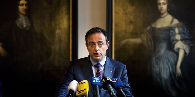 Belgian mayor of Antwerp Bart de Wever speaks to the press under the eyes of the Dutch National Coordinator for Security and Counterterrorism (unseen) and the Dutch mayor of Delft (unseen) in Delft, The Netherlands, on July 8, 2014, after a meeting during which the politicians shared their experiences with Dutch and Belgian citizens who took part in the Jihad. AFP PHOTO / ANP / JERRY LAMPEN **netherlands out** (Photo credit should read JERRY LAMPEN/AFP/Getty Images)