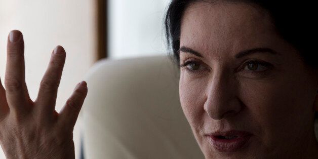 Performance artist Marina Abramovic speaks during an interview at the Rio Film Festival in Rio de Janeiro, Brazil, Thursday, Oct. 4, 2012. The Belgrade-born artist is best known for her piece