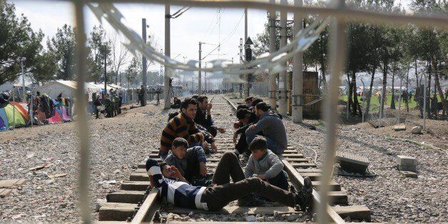 GEVGELIJA, MACEDONIA - MARCH 1: Refugees are seen on a railway at Macedonia - Greece border in Gevgelija, Macedonia on March 1, 2016. (Photo by Besar Ademi/Anadolu Agency/Getty Images)