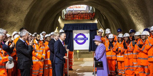 LONDON, UNITED KINGDOM - FEBRUARY 23: Queen Elizabeth unveils the new roundel for the Crossrail line next toTerry Morgan, Chairman of Crossrail and London's mayor Boris Johnson during a visit to the site of the new Crossrail Bond street station which is still under construction on February 23, 2016 in London, England. The Queen unveiled the new roundel for the Crossrail line that is to be renamed the 'Elizabeth line' from December 2018 when the line opens to passengers in the capital. (Photo by Richard Pohle - WPA Pool/Getty Images)