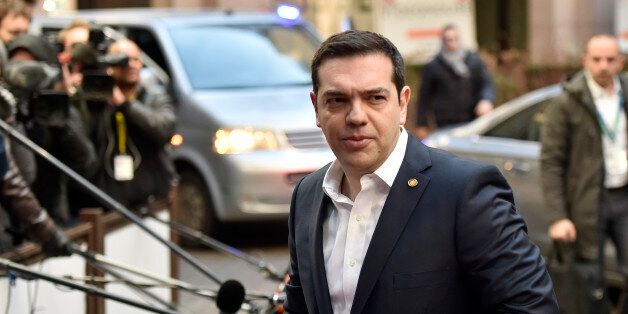 Greek Prime Minister Alexis Tsipras arrives for an EU summit in Brussels on Friday, Feb. 19, 2016. British Prime Minister David Cameron faces tough new talks with European partners after through-the-night meetings failed to make much progress on his demands for a less intrusive European Union. (AP Photo/Martin Meissner)