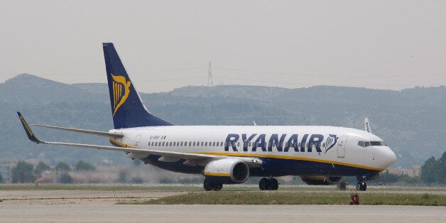 FILE - In this Wednesday, May 13, 2015 file photo, a Ryanair plane lands at the Marseille Provence airport, in Marignane, southern France. Europeâs leading budget airline Ryanair said Tuesday May 26, 2015 they have beaten forecasts again, reporting full-year net profits of 867 million euros ($949 million), 66 percent higher than the year before. (AP Photo/Claude Paris, File)