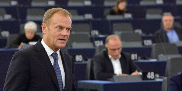 European Council President Donald Tusk delivers a speech during a debate on the ongoing migration crisis at the European Parliament in Strasbourg, eastern France, on October 27, 2015. AFP PHOTO / PATRICK HERTZOG (Photo credit should read PATRICK HERTZOG/AFP/Getty Images)