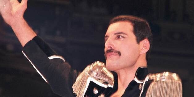 UNITED KINGDOM - SEPTEMBER 01: WEMBLEY ARENA Photo of Freddie MERCURY and QUEEN, Freddie Mercury performing live on stage (Photo by Phil Dent/Redferns)