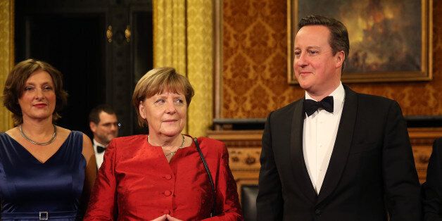 HAMBURG, GERMANY - FEBRUARY 12: Britta Ernst (L) British Prime Minister David Cameron (R) and German Chancellor Angela Merkel attend the annual Matthiae-Mahl dinner at Hamburg City Hall on February 12, 2016 in Hamburg, Germany. The two leaders are there on the invitation of Hamburg Mayor Olaf Scholz, who reportedly saw the dinner as a gesture to show Germany's hope that Great Britain will remain in the European Union. The Matthiae-Mahl is a Hamburg tradition dating back to 1356 and began as a fest to welcome the spring season and also to honor a foreign official. (Photo by Sean Gallup/Getty Images)