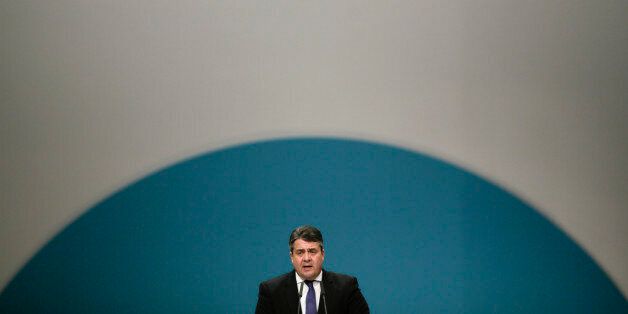 German Social Democratic Party, SPD, chairman Sigmar Gabriel delivers his speech during the party convention in Berlin, Friday, Dec. 11, 2015. (AP Photo/Markus Schreiber)