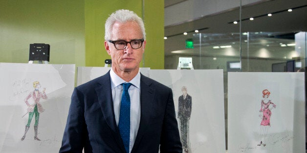 âMad Men,â cast member John Slattery who played Roger Sterling, poses with some objects AMC and Lionsgate TV series,