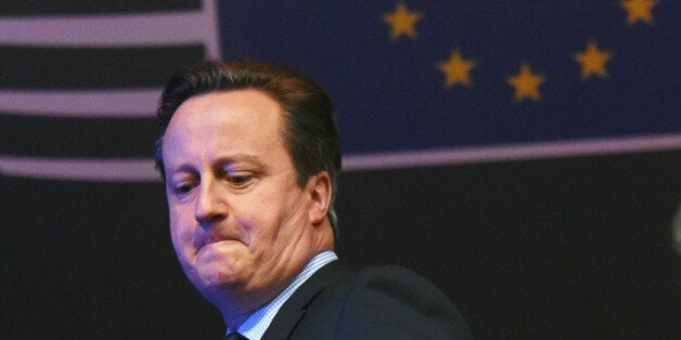 British Prime Minister David Cameron gets into his car at the conclusion of an EU summit in Brussels on Friday, Feb. 19, 2016. European Union leaders are holding a summit in Brussels on Thursday and Friday to hammer out a deal designed to keep Britain in the 28-nation bloc. (AP Photo/Geert Vanden Wijngaert)