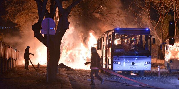 Firefighters work at a scene of fire from an explosion in Ankara, Wednesday, Feb. 17, 2016. A large explosion, believed to have been caused by a bomb, injured several people in the Turkish capital on Wednesday, according to media reports. (IHA via AP) TURKEY OUT