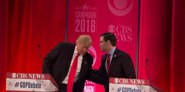 Republican presidential candidates Donald Trump (L) and Marco Rubio (R) following the CBS News Republican Presidential Debate in Greenville, South Carolina, February 13, 2016. / AFP / JIM WATSON (Photo credit should read JIM WATSON/AFP/Getty Images)