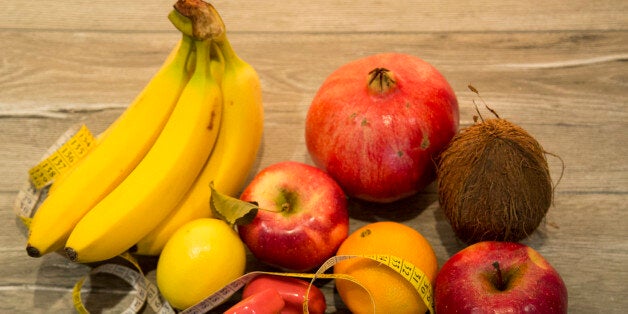 fresh fruits on wooden table