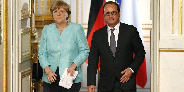 PARIS, FRANCE - JULY 6: French President Francois Hollande meets German Chancellor Angela Merkel to discuss Greece at Elysee Palace on July 6, 2015 in Paris, France. (Photo by Jean Catuffe/Getty Images)