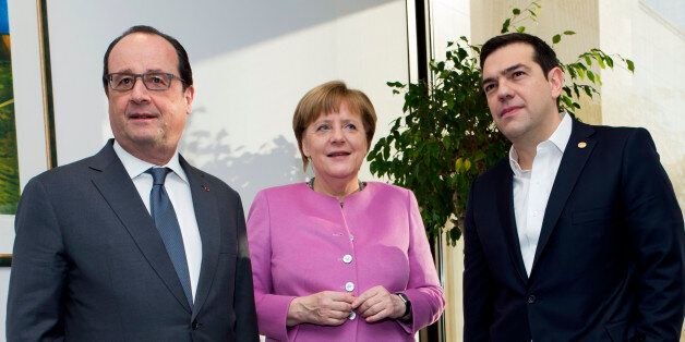 French President Francois Hollande, left, and German Chancellor Angela Merkel, center, stand with Greek Prime Minister Alexis Tsipras during a meeting on the sidelines of an EU summit in Brussels on Friday, Feb. 19, 2016. British Prime Minister David Cameron faces tough new talks with European partners after through-the-night meetings failed to make much progress on his demands for a less intrusive European Union. (John Thys, Pool Photo via AP)
