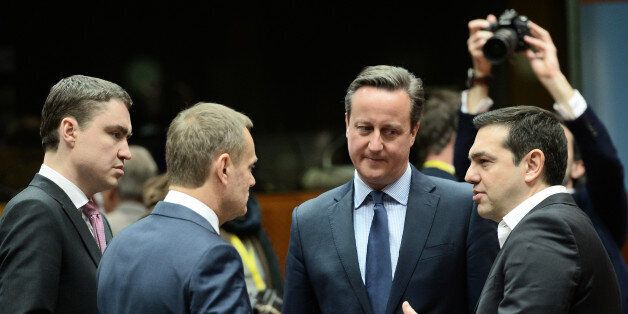 Britain's Prime Minister David Cameron (C), Estonia's Prime minister Taavi Roivas (L), European Council President Donald Tusk (2ndL) listen to Greece's Prime Minister Alexis Tsipras (R) speaking during an EU summit meeting, at the European Union council in Brussels, on February 18, 2016. EU leaders head into a make-or-break summit sharply divided over difficult compromises needed to avoid Britain becoming the first country to crash out of the bloc. / AFP / STEPHANE DE SAKUTIN (Photo credit should read STEPHANE DE SAKUTIN/AFP/Getty Images)