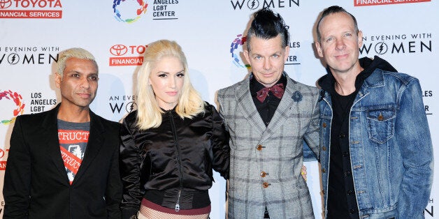 Musicians Tony Kanal, from left, Gwen Stefani, Adrian Young and Tom Dumont of No Doubt arrive at An Evening with Women benefiting the Los Angeles LGBT Center held at the Hollywood Palladium on Saturday, May 16, 2015, in Los Angeles. (Photo by Richard Shotwell/Invision/AP)