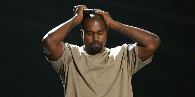 Kanye West reacts as he accepts the video vanguard award at the MTV Video Music Awards at the Microsoft Theater on Sunday, Aug. 30, 2015, in Los Angeles. (Photo by Matt Sayles/Invision/AP)
