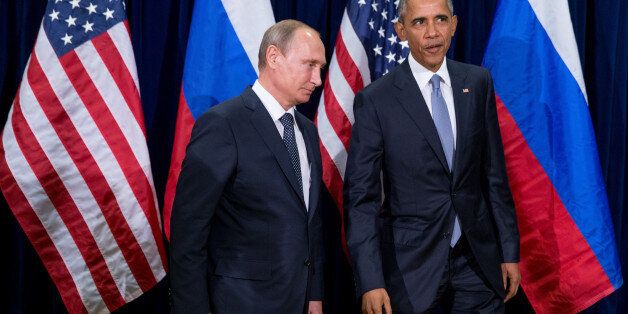 United States President Barack Obama, right, and Russia's President President Vladimir Putin head into a bilateral meeting Monday, Sept. 28, 2015, at United Nations headquarters. (AP Photo/Andrew Harnik)
