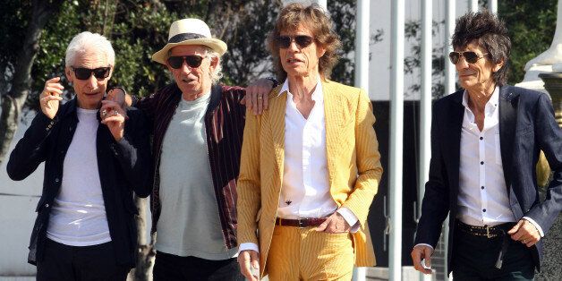 British Rolling Stones' (L-R) Charlie Watts, Keith Richards, Mick Jagger and Ronnie Wood arrive to the National Stadium in Santiago on February 1, 2016, for a sound test. AFP PHOTO/JORGE AMENGUAL / AFP / JORGE AMENGUAL (Photo credit should read JORGE AMENGUAL/AFP/Getty Images)