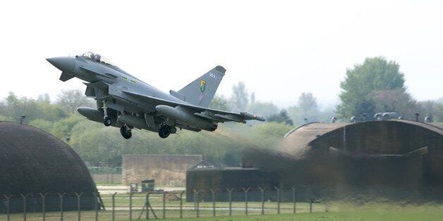 In this photo released by Britain's RAF, one of Britain's Royal Air Force Typhoon aircraft lifts off from an RAF base near Lincoln, England, Monday April 28, 2014, deployed to take part in the NATO Baltic Air Policing (BAP) mission over Estonia, Latvia and Lithuania. The UK fast jets will reinforce the Polish contribution to provide NATO air policing over Baltic member states. Tensions in eastern Baltic states have escalated in response to the continued unstable situation in Ukraine. (AP Photo / RAF, Cpl Phil Major (RAF))