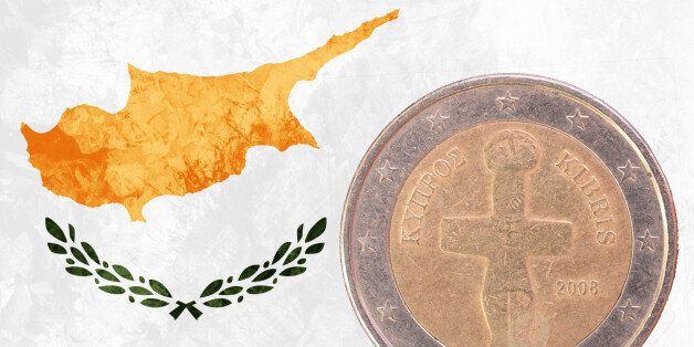 Two euros coin from Cyprus isolated on the national cypriot flag as background