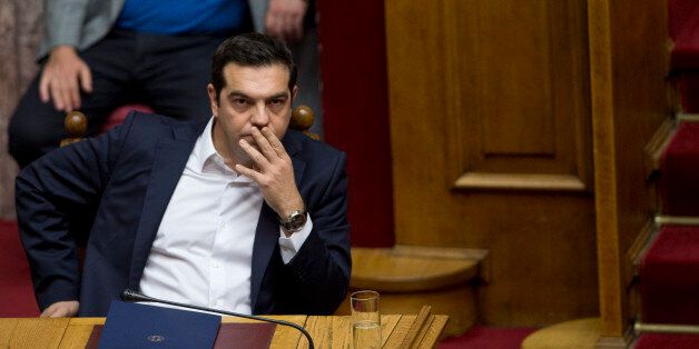 Greek Prime Minister Alexis Tsipras attends a parliament session before his speech at the policies statement of his newly elected government, Athens, Monday, Oct. 5, 2015. Greece's European creditors voiced hope Monday that the country's government will deliver on promises to overhaul its economy, which would pave the way to the release of billions of bailout cash and potential help on debt repayments. (AP Photo/Petros Giannakouris)