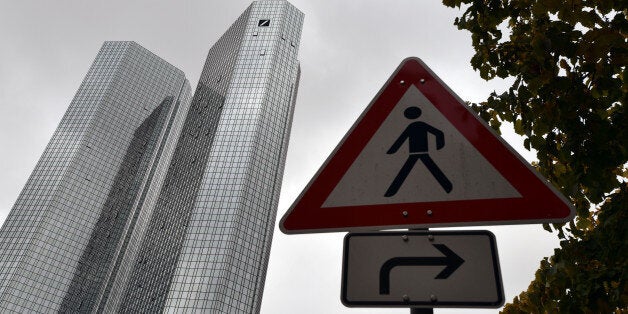 FRANKFURT AM MAIN, GERMANY - OCTOBER 29: The headquarters of German bank Deutsche Bank pictured on October 29, 2015 in Frankfurt, Germany. Deutsche Bank announced at a press conference earlier in the day that the company recorded its biggest three-month loss ever of EUR 6 billion and will embark on a cost-cutting effort that will include withdrawing from 10 countries and reducing its full-time global labor force from the current 103,000 down to 77,000 over coming years.(Photo by Thomas Lohnes/Getty Images)