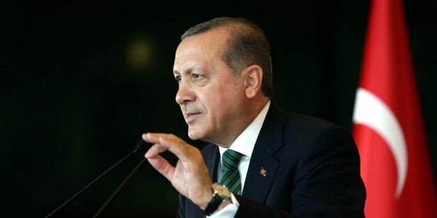 ANKARA, TURKEY - FEBRUARY 17: President of Turkey Recep Tayyip Erdogan delivers a speech during the 2th Local administrators meeting at Presidential complex in Ankara, Turkey on February 17, 2016. (Photo by Murat Cetinmuhurdar/Turkish Presidency/Anadolu Agency/Getty Images)