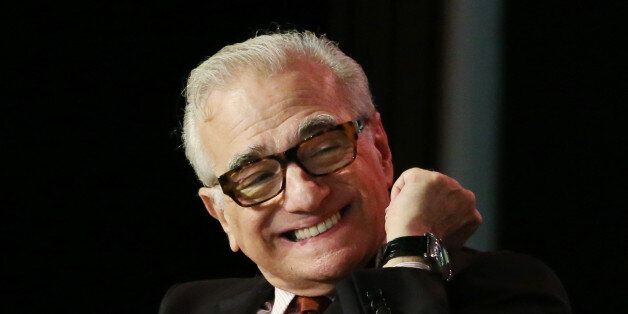 Film director Martin Scorsese smiles during a news conference in Macau, Tuesday, Oct. 27, 2015. China's world-beating gambling hub is getting a taste of Hollywood glamour as its newest casino resort makes its debut on Tuesday with a glitzy grand opening that masks turmoil behind the scenes. (AP Photo/Kin Cheung)