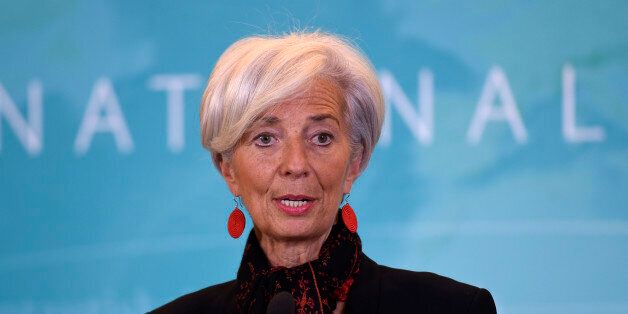 International Monetary Fund (IMF) Managing Director Christine Lagarde speaks during a news conference at the IMF in Washington, Monday, Nov. 30, 2015, to announce the Chinese yuan will join a basket of the world's leading currencies. (AP Photo/Susan Walsh)