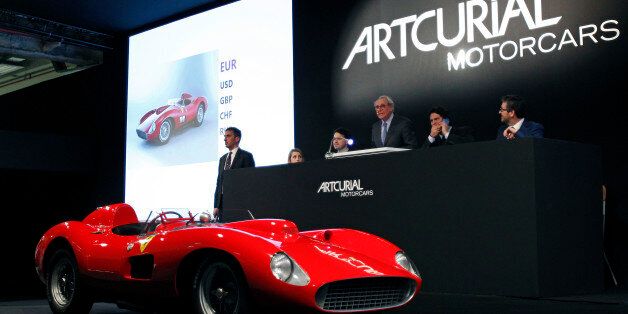 PARIS, FRANCE - FEBRUARY 05: 1957 Ferrari 335 S Spider Scaglietti model from the Pierre Bardinon collection is displayed during the auction at Retromobile show by the Artcurial auction house on February 05, 2016 in Paris, France. Estimated between 28 and 32 million euros, the 335 Sport Scaglietti finally sold for 32,075 million euros (35,695 million dollars), becoming the second most expensive car in the world behind the Ferrari 250 GTO 1962 which sold for for 34,025 million euros (37,868 million dollars) (Photo by Chesnot/Getty Images)