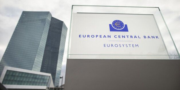 The euro currency symbol sits on a sign outside the European Central Bank (ECB) headquarters in Frankfurt, Germany, on Thursday, Dec. 3, 2015. European stocks extended losses, following their biggest slide since August yesterday after European Central Bank President Mario Draghi unveiled stimulus measures that fell short of market expectations. Photographer: Jasper Juinen/Bloomberg via Getty Images