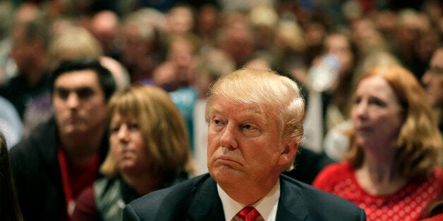 Republican presidential candidate Donald Trump visits a caucus site, Monday, Feb. 1, 2016, in West Des Moines, Iowa. (AP Photo/Jae C. Hong)