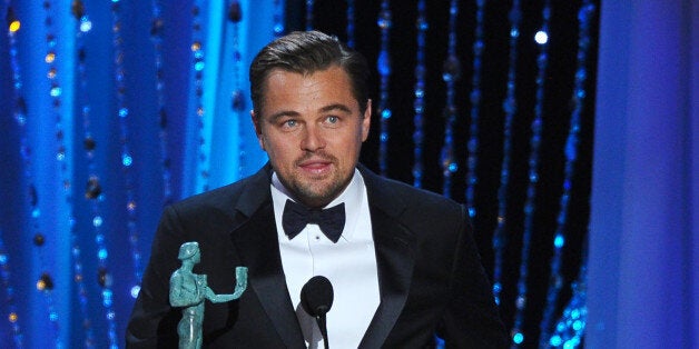 Leonardo DiCaprio accepts the award for outstanding male actor in a leading role for âThe Revenantâ at the 22nd annual Screen Actors Guild Awards at the Shrine Auditorium & Expo Hall on Saturday, Jan. 30, 2016, in Los Angeles. (Photo by Vince Bucci/Invision/AP)