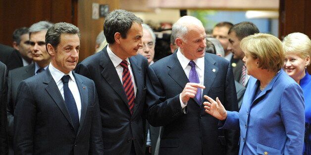 (L-R) French President Nicolas Sarkozy, Spanish Prime Minister Jose Luis Zapatero, Greek Prime Minister George A. Papandreou and German Chancellor Angela Merkel arrive for a working session of an European Union summit at the European Council headquarters on March 25, 2010 in Brussels. French President Nicolas Sarkozy and German Chancellor Angela Merkel struck a deal on Thursday to help Greece tackle a debt crisis that has dragged down the euro, Sarkozy's office said. AFP PHOTO / GEORGES GOBET