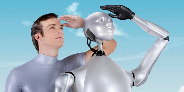 A Man and a Robot staring into the distance