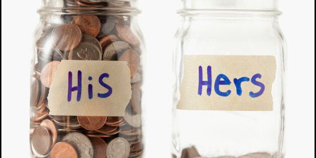 Studio shot of two jars with coins labeled ''Hers'' and ''His