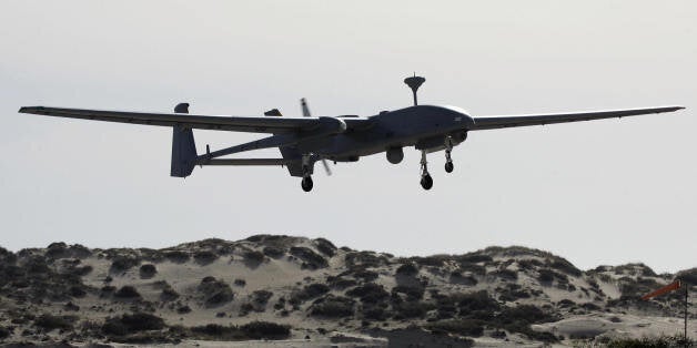 PALMAHIM AIR BASE, ISRAEL: An Israeli Air Force drone named the Heron takes off during a military ceremony held at the Palmahim Air Force base, south of Tel Aviv, 07 March 2007. The Israeli air force today unveiled its first long-range unmanned aerial vehicle reportedly capable of carrying out reconnaissance missions thousands of kilometres away. AFP PHOTO/DAVID FURST (Photo credit should read DAVID FURST/AFP/Getty Images)