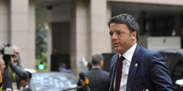 Italian Prime Minister Mateo Renzi arrives for a meeting in Brussels of the leaders of the 19 countries that use the euro currency, on July 12, 2015. The EU cancelled a full 28-nation summit today to decide whether Greece stays in the European single currency as a divided eurozone struggled to reach a reform-for-bailout deal. AFP PHOTO / JEAN-CHRISTOPHE VERHAEGEN (Photo credit should read JEAN-CHRISTOPHE VERHAEGEN/AFP/Getty Images)
