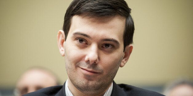 Martin Shkreli, former chief executive officer of Turing Pharmaceuticals LLC, smiles during a House Committee on Oversight and Government Reform hearing on prescription drug prices in Washington, D.C., U.S., on Thursday, Feb. 4, 2016. Shkreli, who is no longer with Turing and faces federal fraud charges unrelated to the drugmaker, declined to make any comments to the committee. 'On the advice of counsel, I invoke my Fifth Amendment,' Shkreli said. Photographer: Pete Marovich/Bloomberg via Getty Images