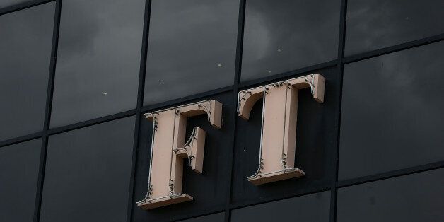 LONDON, ENGLAND - JULY 23: The Financial Times logo sits on display outside the headquarters of the newspaper on July 23, 2015 in London, England. Japanese media company Nikkei have reached an agreement to buy the Financial Times Group from publishing group Pearson for Â£844m. The Financial Times is a British, English language newspaper launched in 1888 and has a combined print and online readership of 720,000. It is part of the FT group which also includes a 50% stake in The Economist and Russian newspaper Vedemosti. (Photo by Danny E. Martindale/Getty Images)