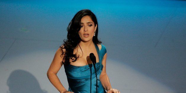 HOLLYWOOD - MARCH 05: ***EMBARGOED FROM INTERNET AND ONLINE USAGE UNTIL CONCLUSION OF OSCAR BROADCAST*** Actress Salma Hayek presents the Achievement in Music Written for Motion Picture award on stage during the 78th Annual Academy Awards at the Kodak Theatre on March 5, 2006 in Hollywood, California. (Photo by Kevin Winter/Getty Images)