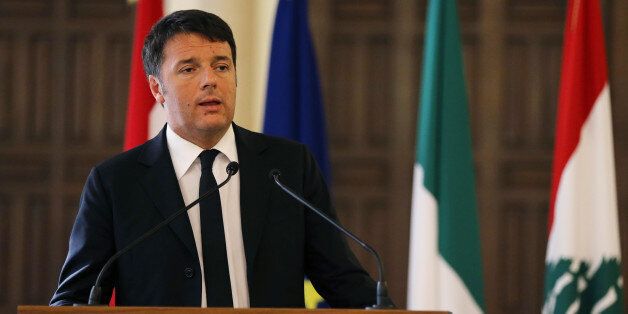 Italian Prime Minister Matteo Renzi, speaks during a joint press conference with his Lebanese counterpart Tammam Salam, at the government house in Beirut, Lebanon, Tuesday Dec. 22, 2015. Renzi is in Lebanon to meet with Lebanese officials and to visit the Italian UN peacekeepers who work in south Lebanon and to visit Syrian refugee schools. (AP Photo/Hussein Malla)