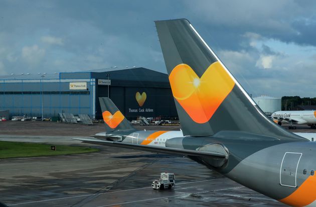 Thomas Cook planes on the runway at terminal one Manchester Airport.