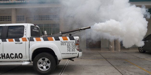 Spraying equipment in the back of a pickup truck from the Chacao municipality is used to fumigate the grounds of a school to eradicate the mosquitoes that cause the Zika virus in Caracas, Venezuela, on Friday, Feb. 5, 2016. Venezuela's Health Ministry says the country may have 10,000 cases of Zika, according to Agencia Venezolana de Noticias. Photographer: Wilfredo Riera/Bloomberg via Getty Images